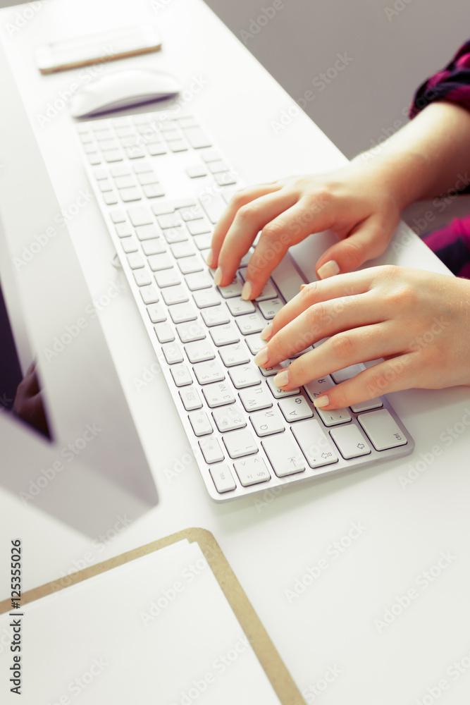 Hands of an office woman typing Hands of an office woman typing