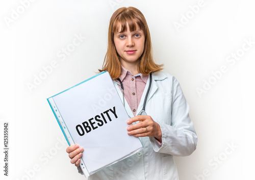 Female doctor showing clipboard with written text: Obesity