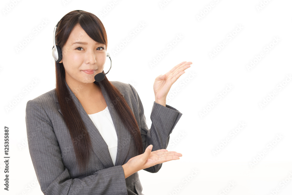 案内する笑顔のオペレーター 案内する笑顔のオペレーター