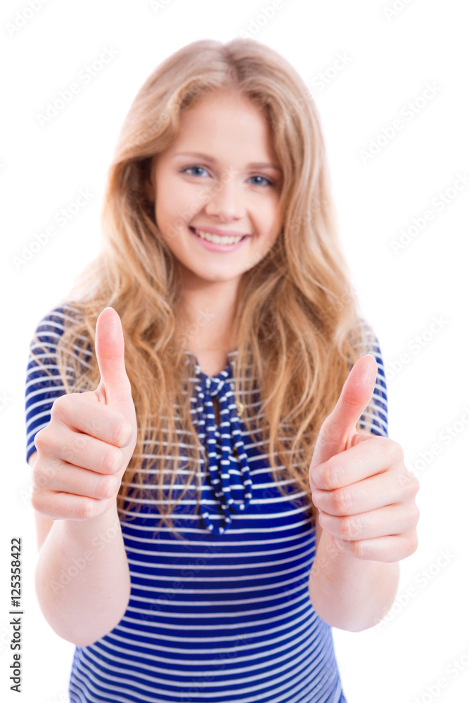 happy blond girl showing OK - thumbs up