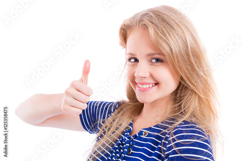 happy blond girl showing OK - thumb up