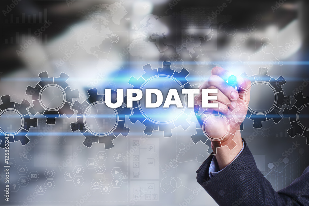 Businessman is drawing on virtual screen. update concept. Businessman is drawing on virtual screen. update concept.