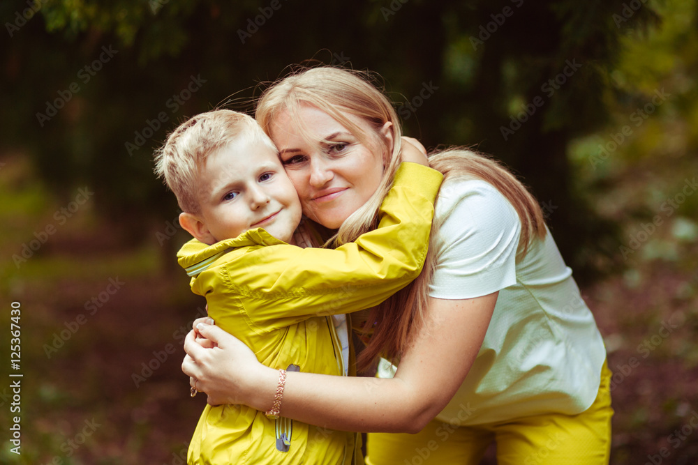 Beautiful woman with her son outside Beautiful woman with her son outside