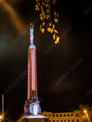 Beautifuly lit Monument of Freedom in Riga, Latvia photo