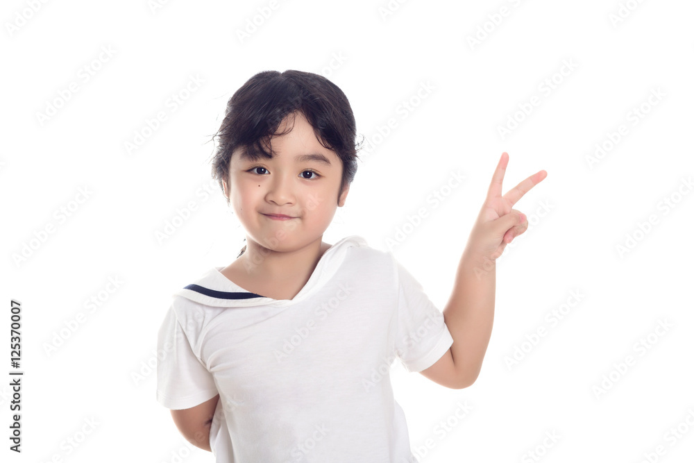 Portrait of happy little Asian child finger up on isolated backg Portrait of happy little Asian child finger up on isolated backg