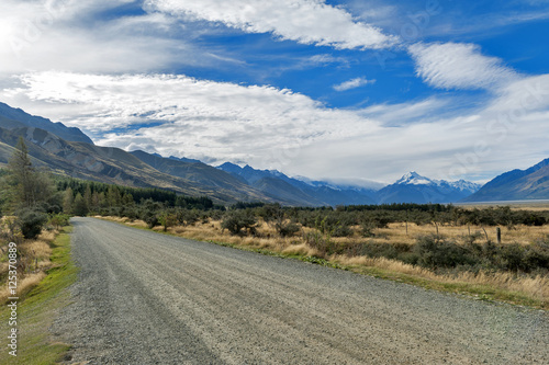 Gravel road to campsite at Glentanner Park Centre with Aoraki / Mount Cook seen in background