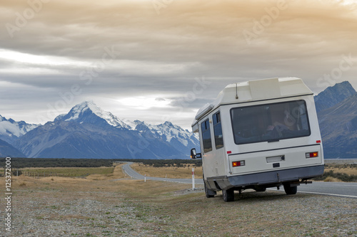 Motorhome on Mount Cook Road (State Highway 80) along the Tasman River leading to Aoraki / Mount Cook National Park and the village