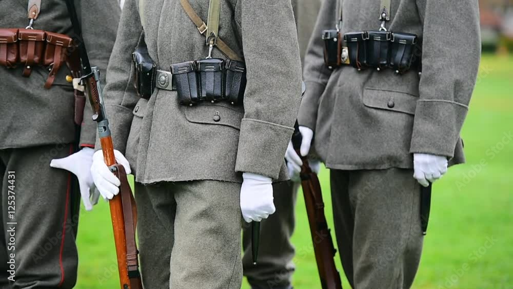 Historical military reenactment with soldier uniforms from World War One Historical military reenactment with soldier uniforms from World War One