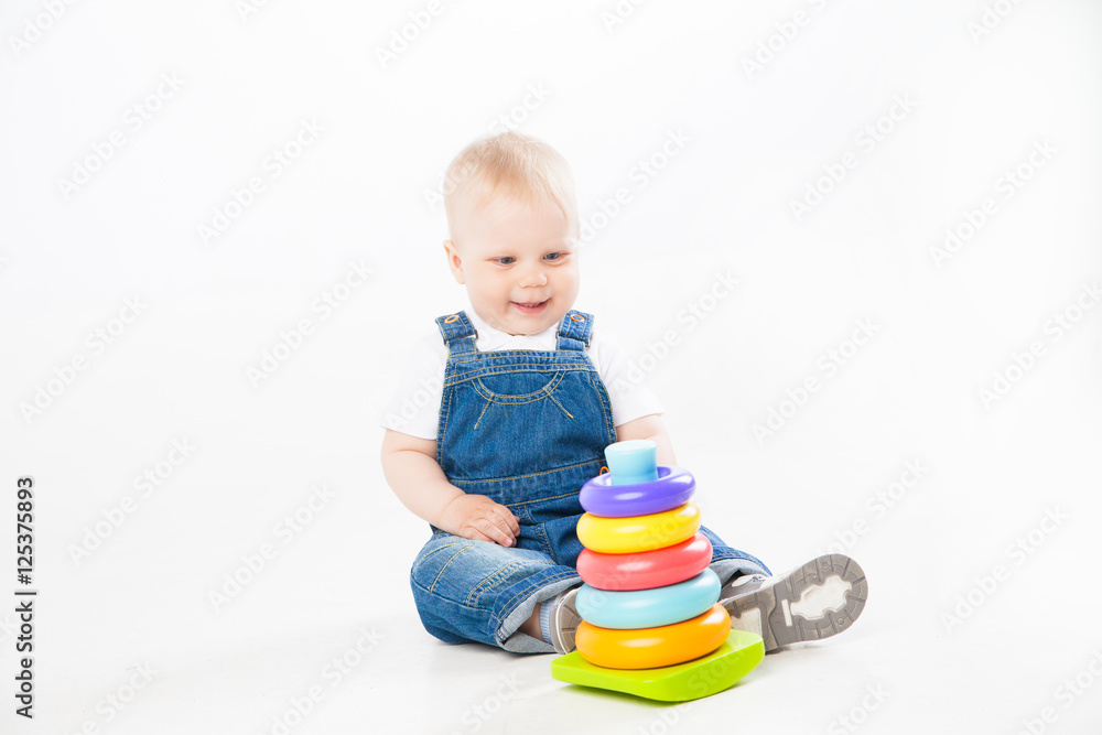 Adorable toddler playing with toy Adorable toddler playing with toy
