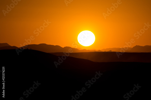 Sunset on Sahara desert