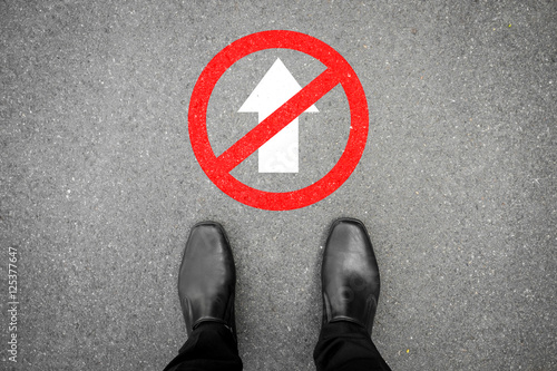 Black shoes standing and cannot go forward