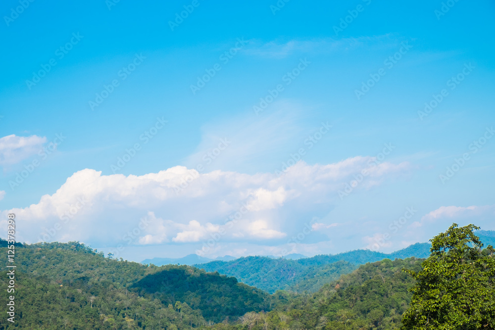 Mountains and tree with beautiful blue sky and cloud in the morning. Mountains and tree with beautiful blue sky and cloud in the morning.
