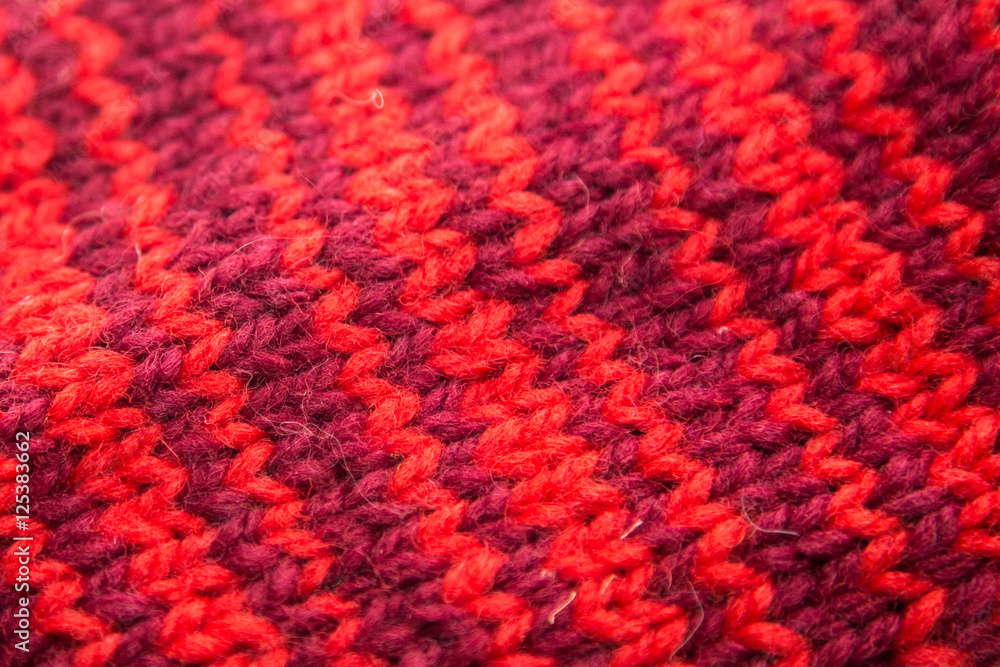 Handmade knitted pattern closeup