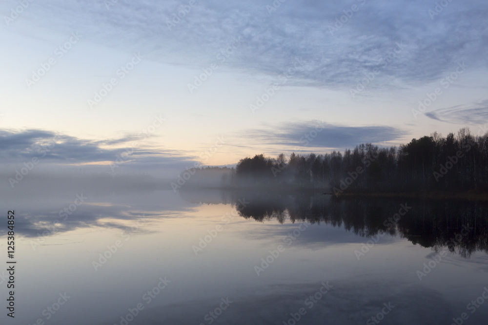 Silent foggy evening in Finland. Calm waters, cold night. Beautiful and silent.