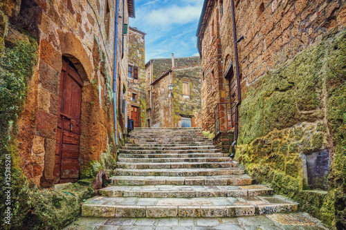 Fototapeta Naklejka Na Ścianę i Meble -  Alley in old town Pitigliano, Tuscany, Italy