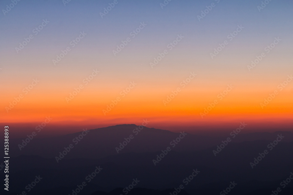 Layer of mountain and skyline after sunset Layer of mountain and skyline after sunset