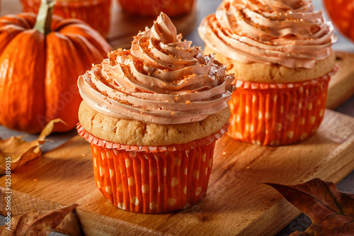 Pumpkin cupcakes with glitter sugar sprinkles. photo