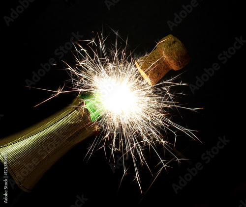 New Year's fireworks sparks from the bottle chmpagne