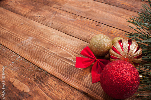 Christmas decoration on wooden table over grunge background