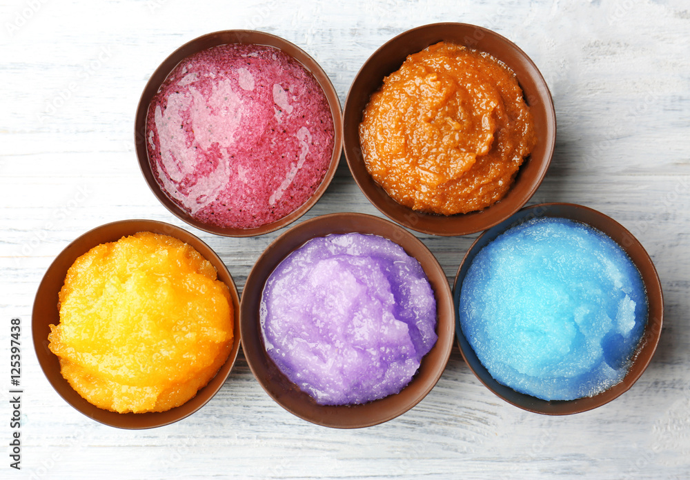 Body scrubs on wooden background Body scrubs on wooden background