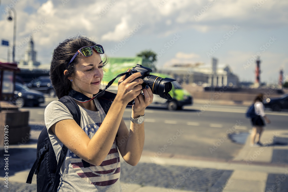 Young photographer exploring the city, Saint-Petersburg