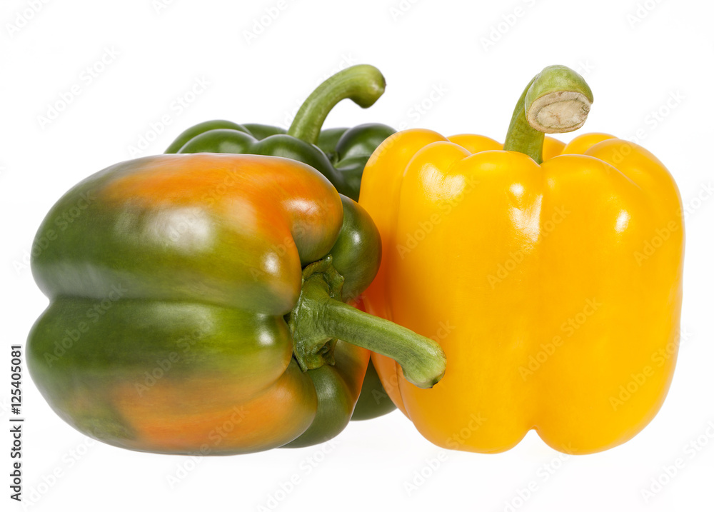 Vegetables of yellow and green peppers on white background Vegetables of yellow and green peppers on white background
