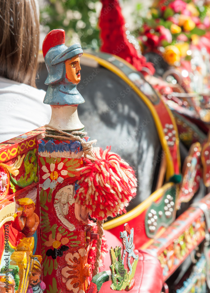Fototapeta premium Closeup view of a colorful detail of a typical sicilian cart