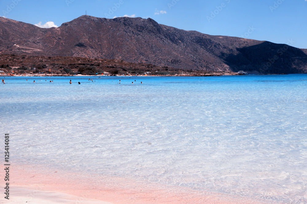 Pink sand beach with azure clear water of famous Elafonisi, Crete, Greece Pink sand beach with azure clear water of famous Elafonisi, Crete, Greece