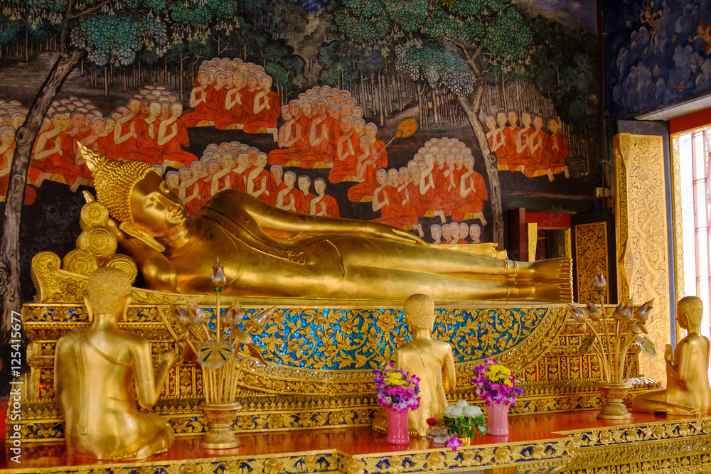 Reclining Buddha gold statue and thai art architecture in Wat Bovoranives, Bangkok, Thailand. Photo taken on: October 30, 2016 ..