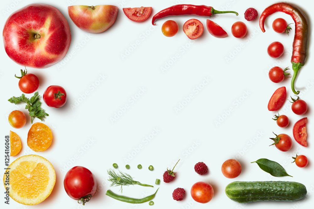 Frame of vegetables and fruits on white
