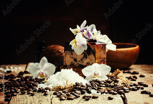 Organic coffee spa products, vintage wooden background, selectiv photo