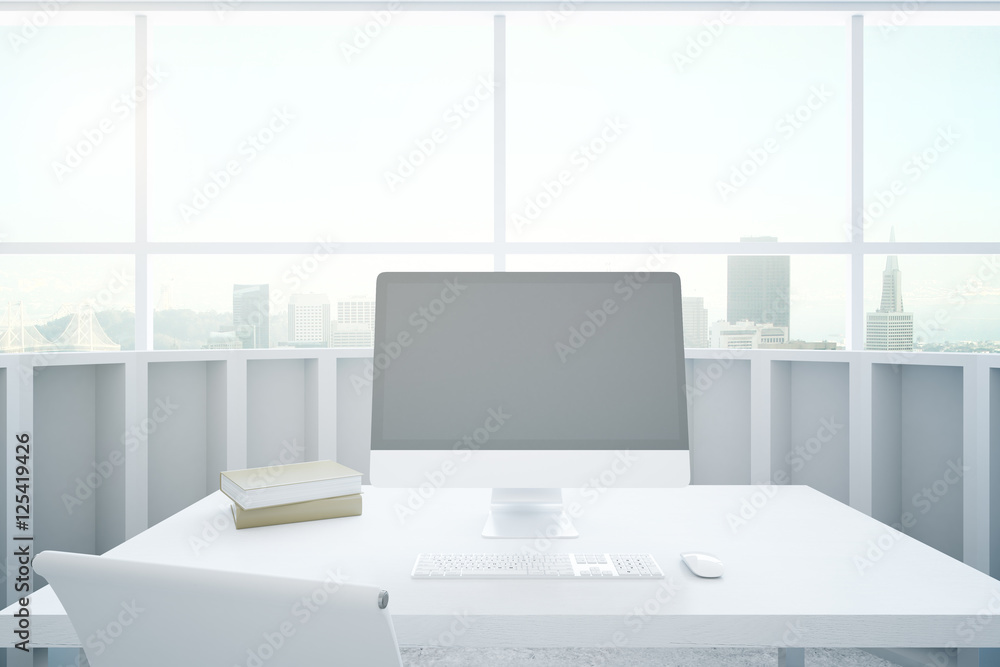 White desktop with computer