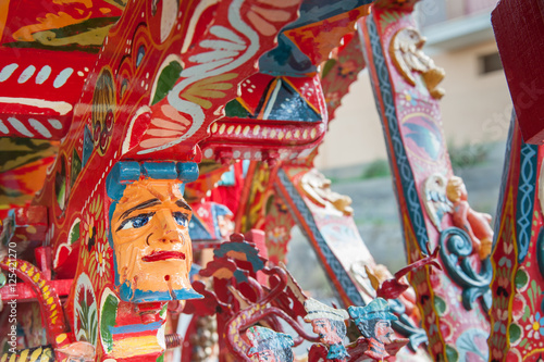 Closeup view of a colorful detail of a typical sicilian cart