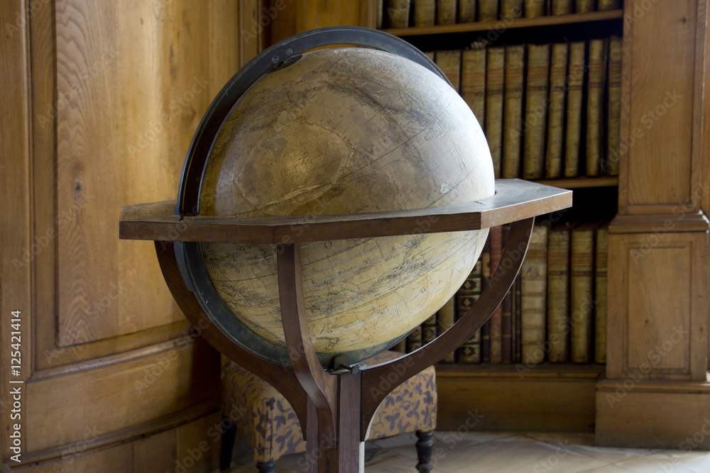 Vintage globe on a table in a library