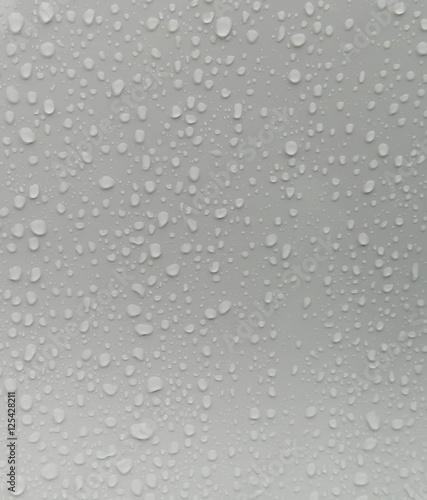 Water drops on metallic surface for background