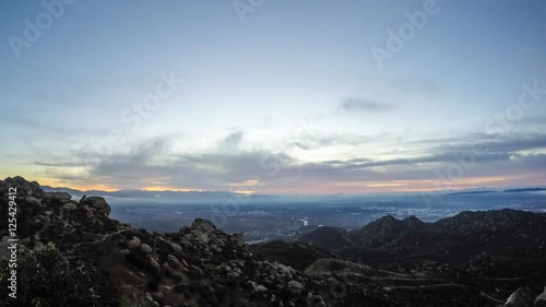 San Fernando Valley sunrise light time lapse in Los Angeles Caifornia.  Shot from Rocky Peak Mountain Park in Ventura County. photo