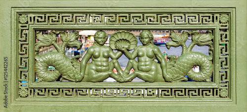 Fragment of an old pig-iron lattice of a protection of Anichkov