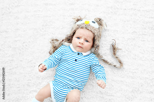 Cute baby with funny knitte...