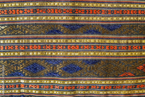 Colorful peruvian style rug surface close up. More of this motif