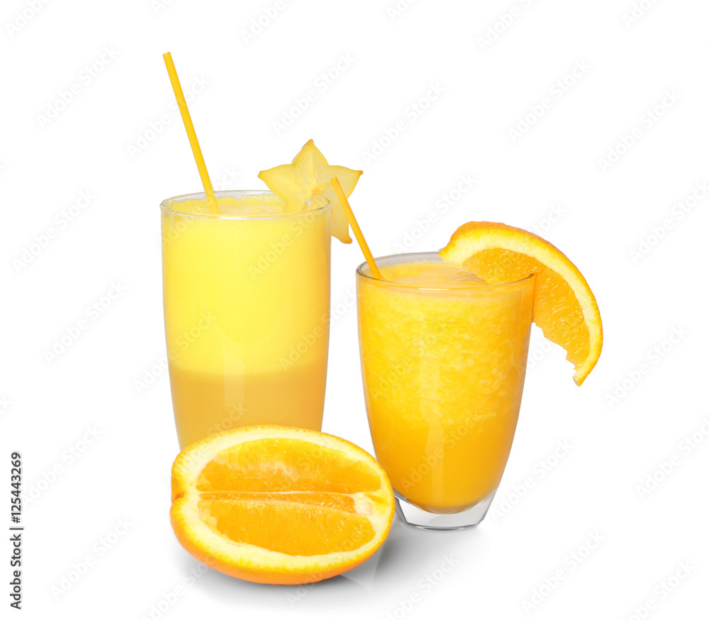 Orange and carambola smoothies on white background Orange and carambola smoothies on white background