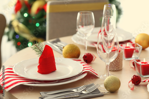 Table served for Christmas dinner in living room, close up view