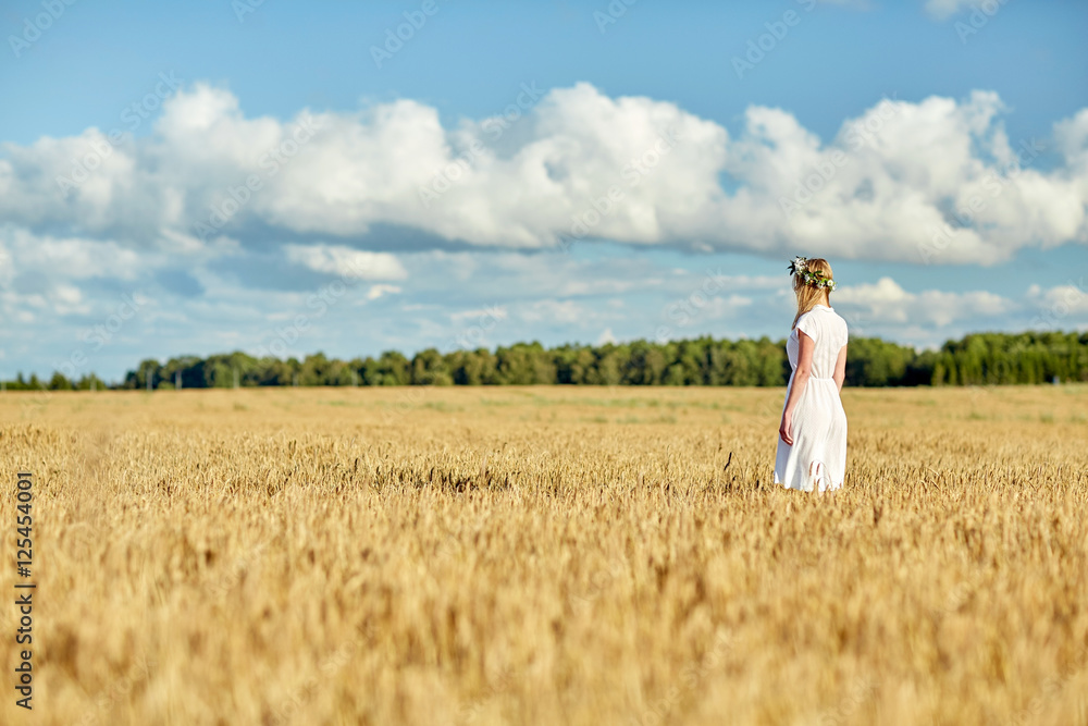 happy young woman in flower wreath on cereal field happy young woman in flower wreath on cereal field