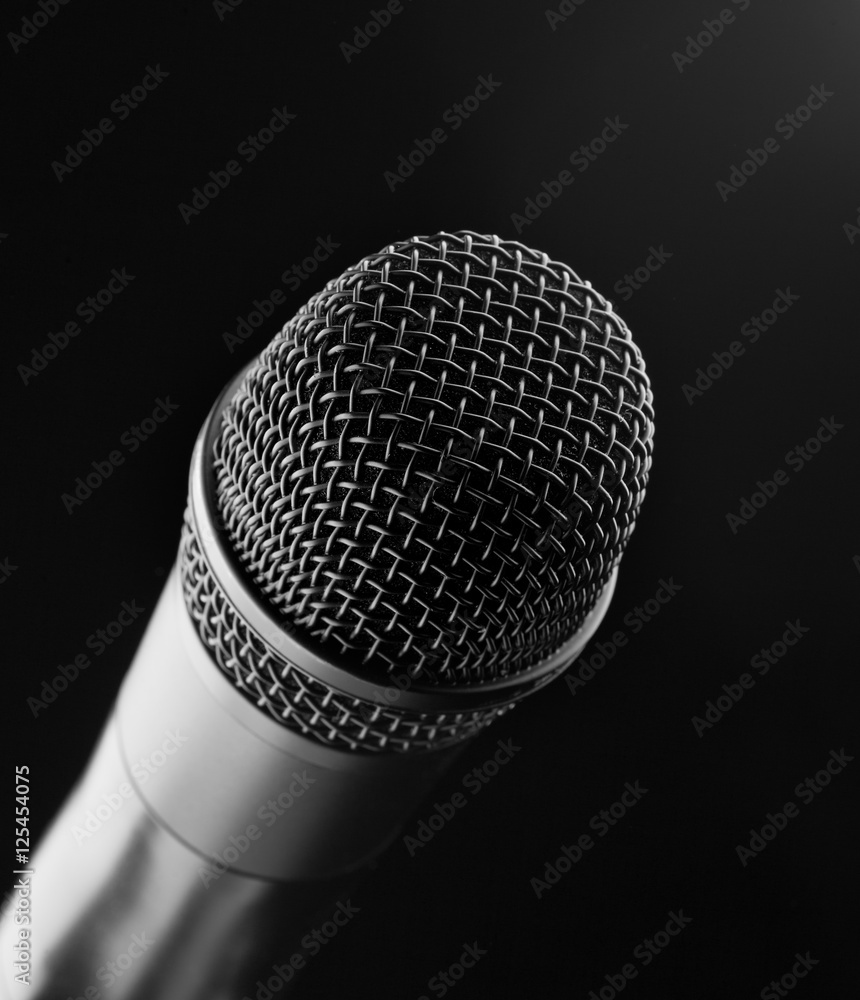 microphone on a dark background microphone on a dark background