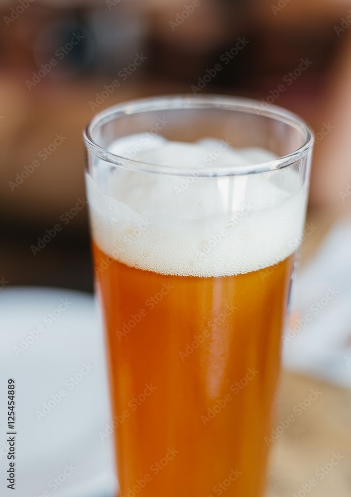 Glass of light Beer in Restaurant Glass of light Beer in Restaurant