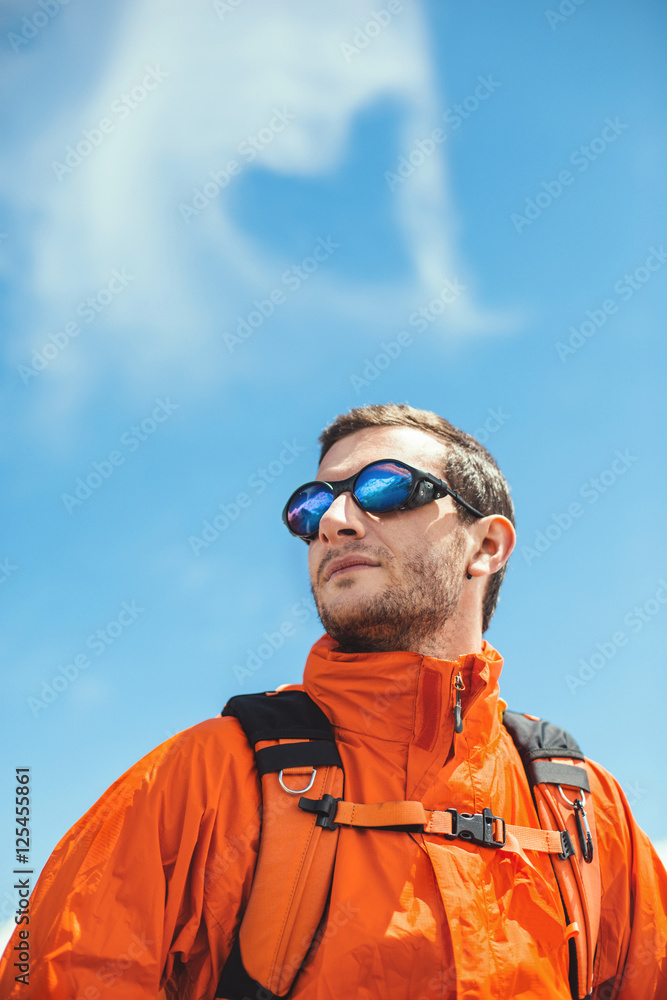 The mountains are calling. Mountaineer looking at distance The mountains are calling. Mountaineer looking at distance