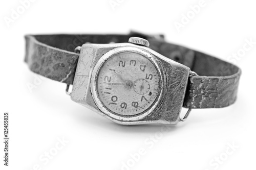 old men's wristwatch on a white background / black and white photo in retro style