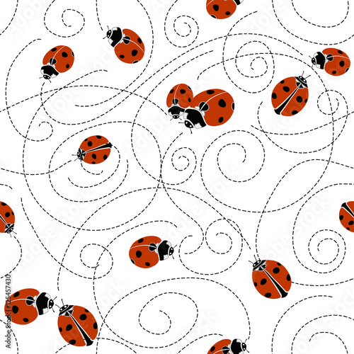 Seamless pattern with ladybirds.