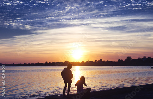 siluete on the beach photo