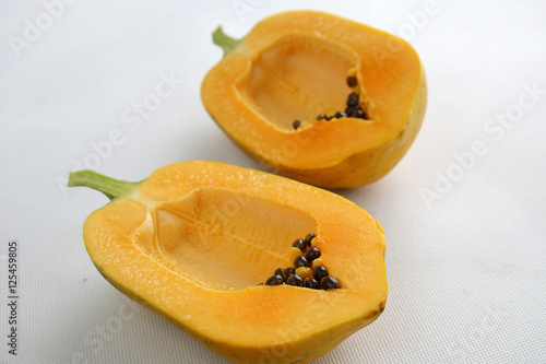 Papaya on white background, tropical fruit