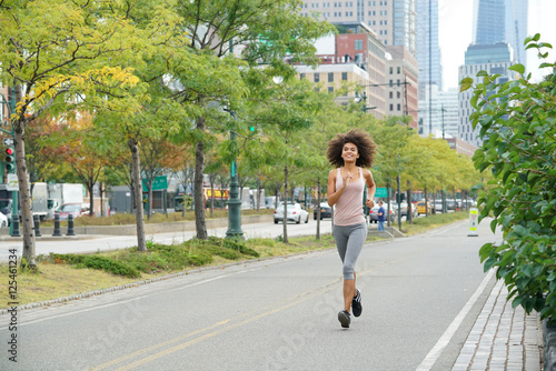 Young woman jogging in South Manhattan